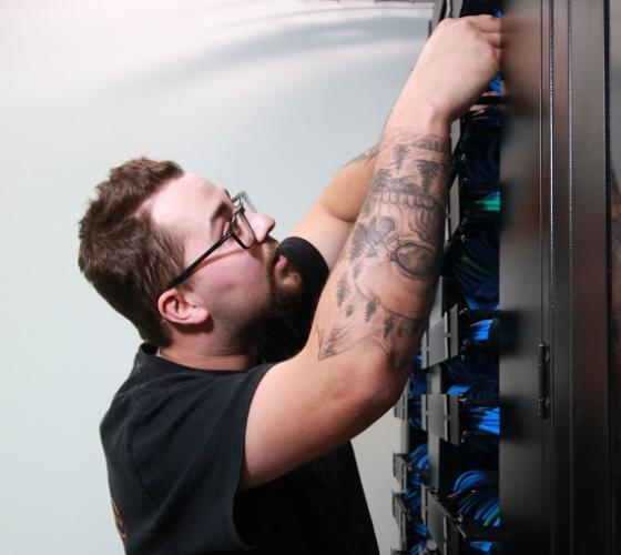 IT student working on server