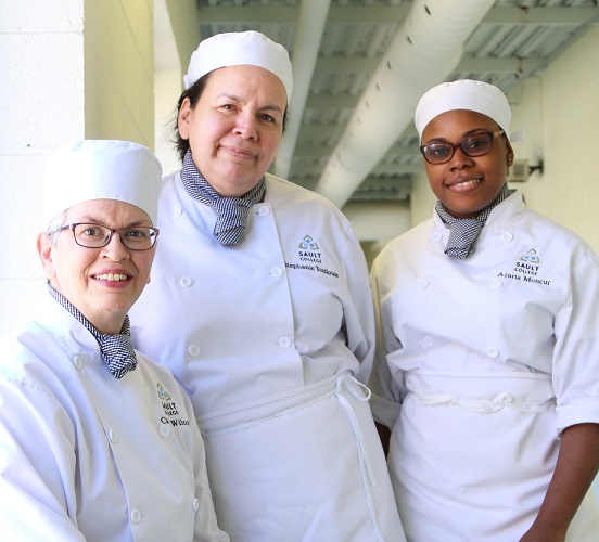 Culinary students posing for camera for their participation in developing a recipe for the Salt Free Canada cookbook