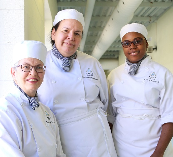 Culinary students posing for camera for their participation in developing a recipe for the Salt Free Canada cookbook