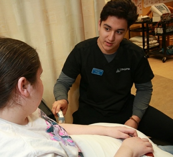 OTA & PTA student treating a patient in Physiotherapy Clinic