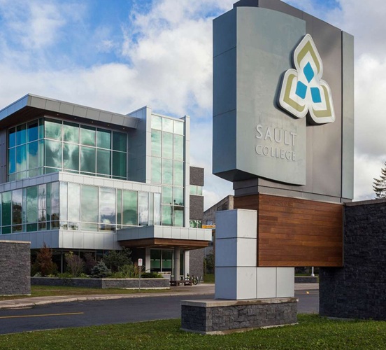 Exterior of Sault College campus from Northern Ave showing sign and M-Wing building