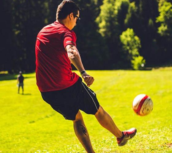 Male kicking a soccer ball