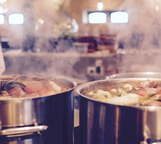 Closeup of steamy soup pot