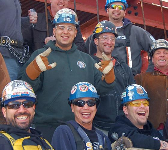 Group of male iron worker students smiling.