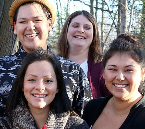 Students looking and smiling at camera