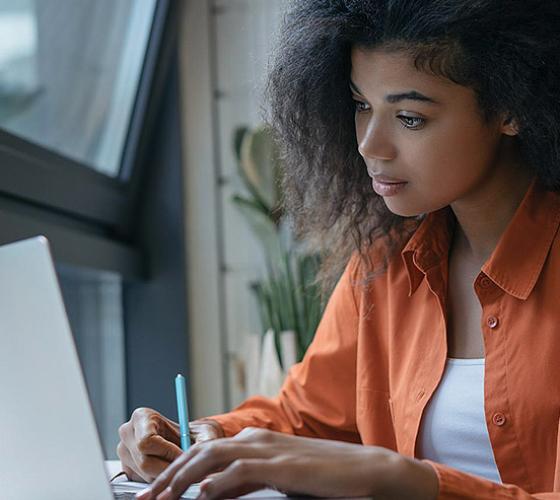 Girl looking at computer