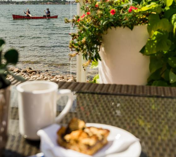 patio view with coffee and treat