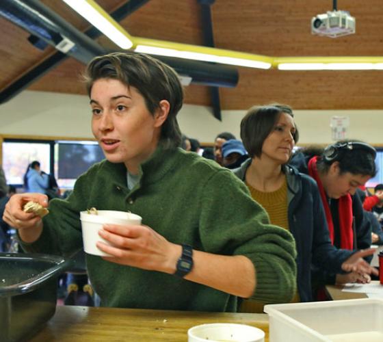 indigenous student getting a meal at gathering