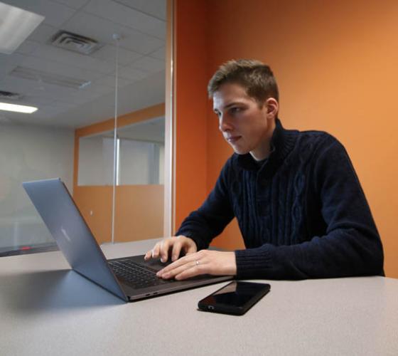 Student looking at computer