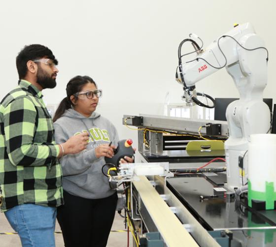 Bachelor of Engineering - Mechatronics students working in the robotics and engineering lab