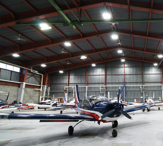 Aviation Hangar inside with planes parked
