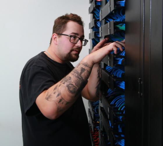 IT student working on server