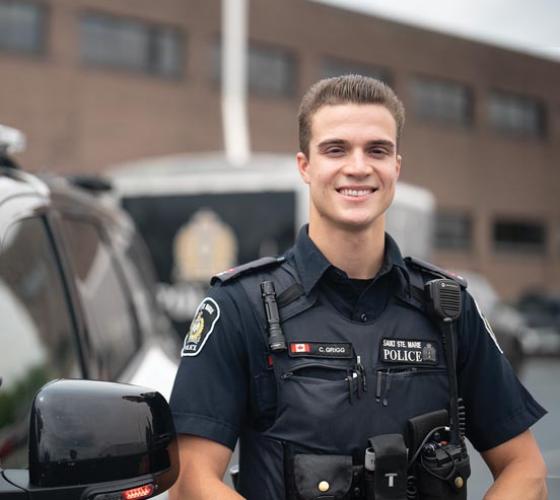 Policing student in city police uniform