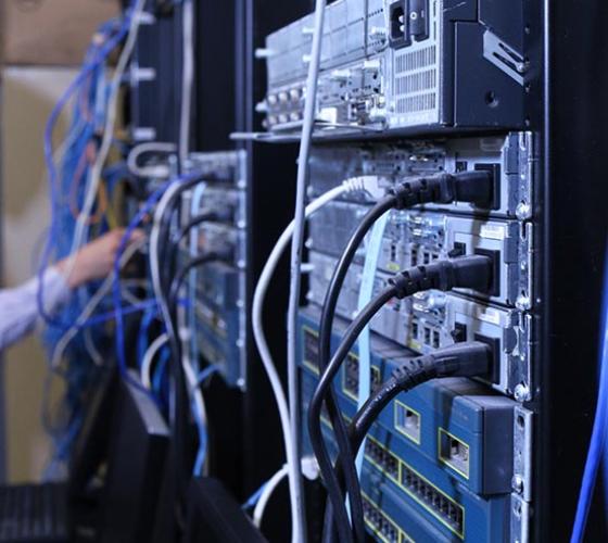 IT servers shown as students practice hands-on skills