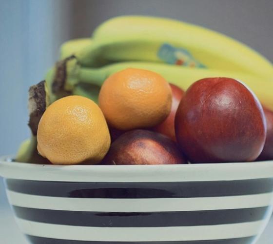 Bowl of fruit like apples, oranges and bananas