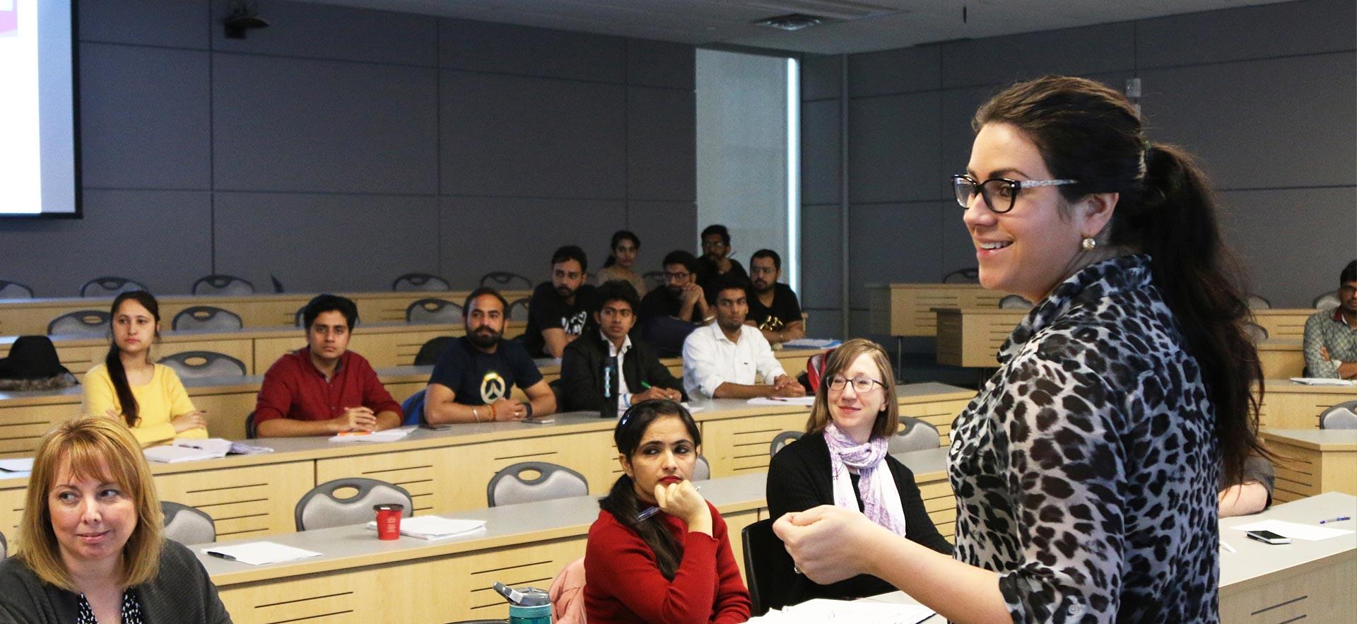 A Supply Chain Management instructor leads a class discussion in one of the college’s multi media classrooms. 