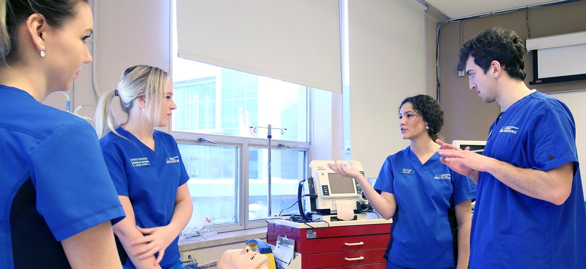 Nursing students having a class related discussion.