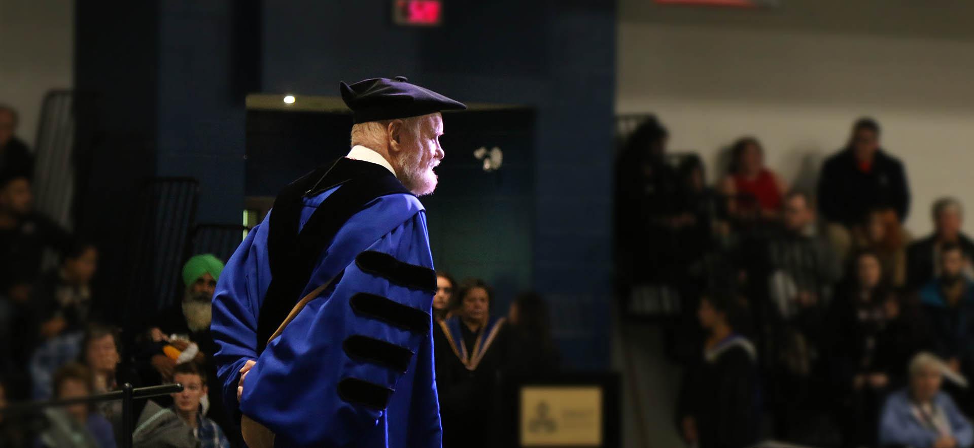 President Dr. Ron Common in convocation gown