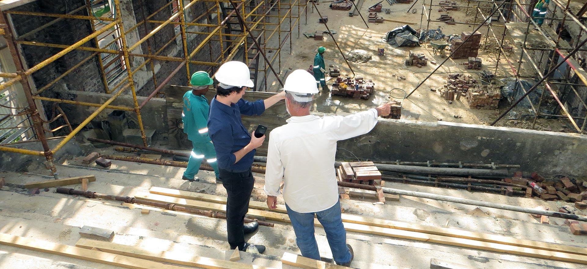 Construction manager reviews work site.