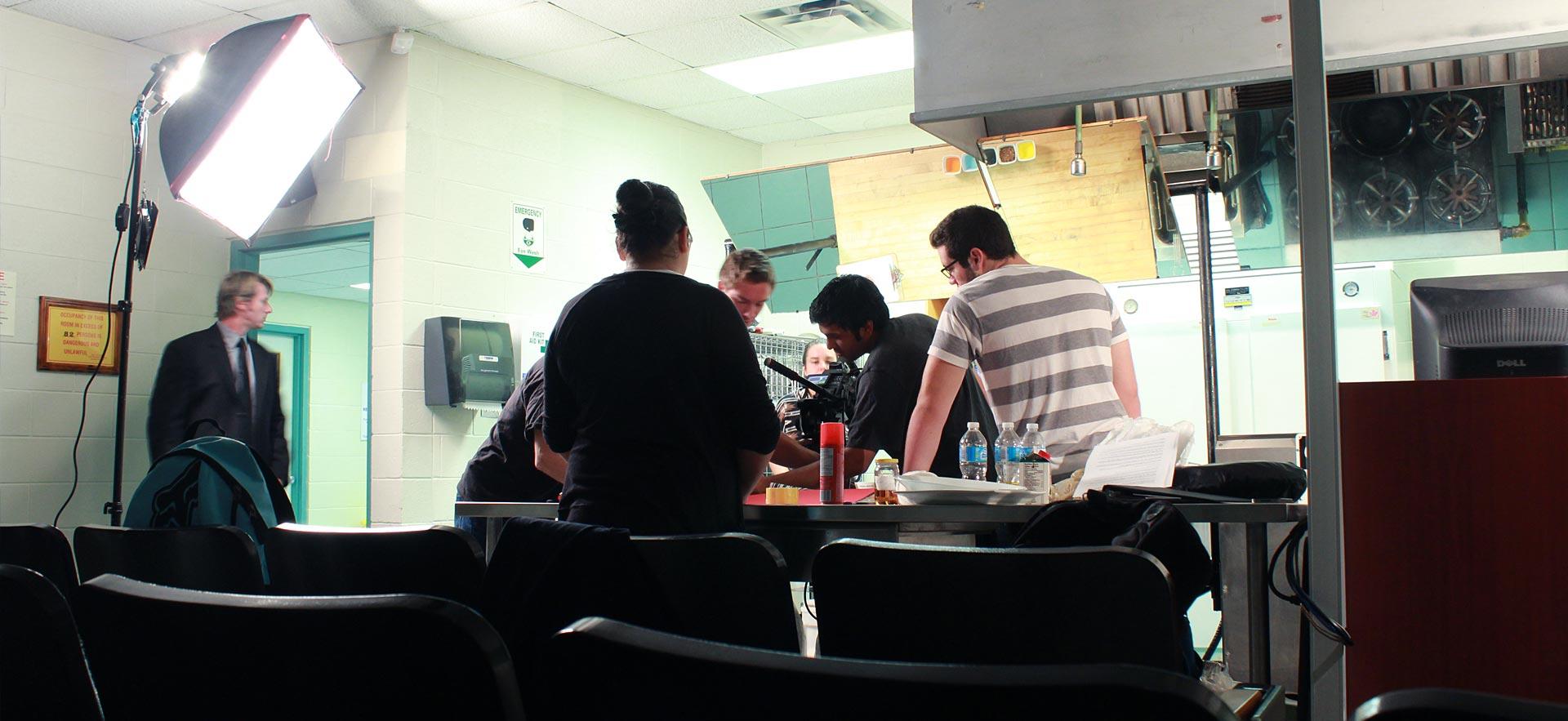 Digital video students shoot a video on the Sault College campus.