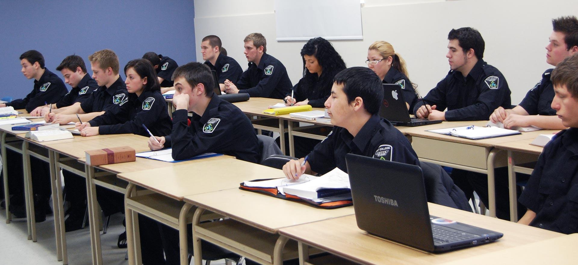 A Police Foundation class listens to their instructor during class.