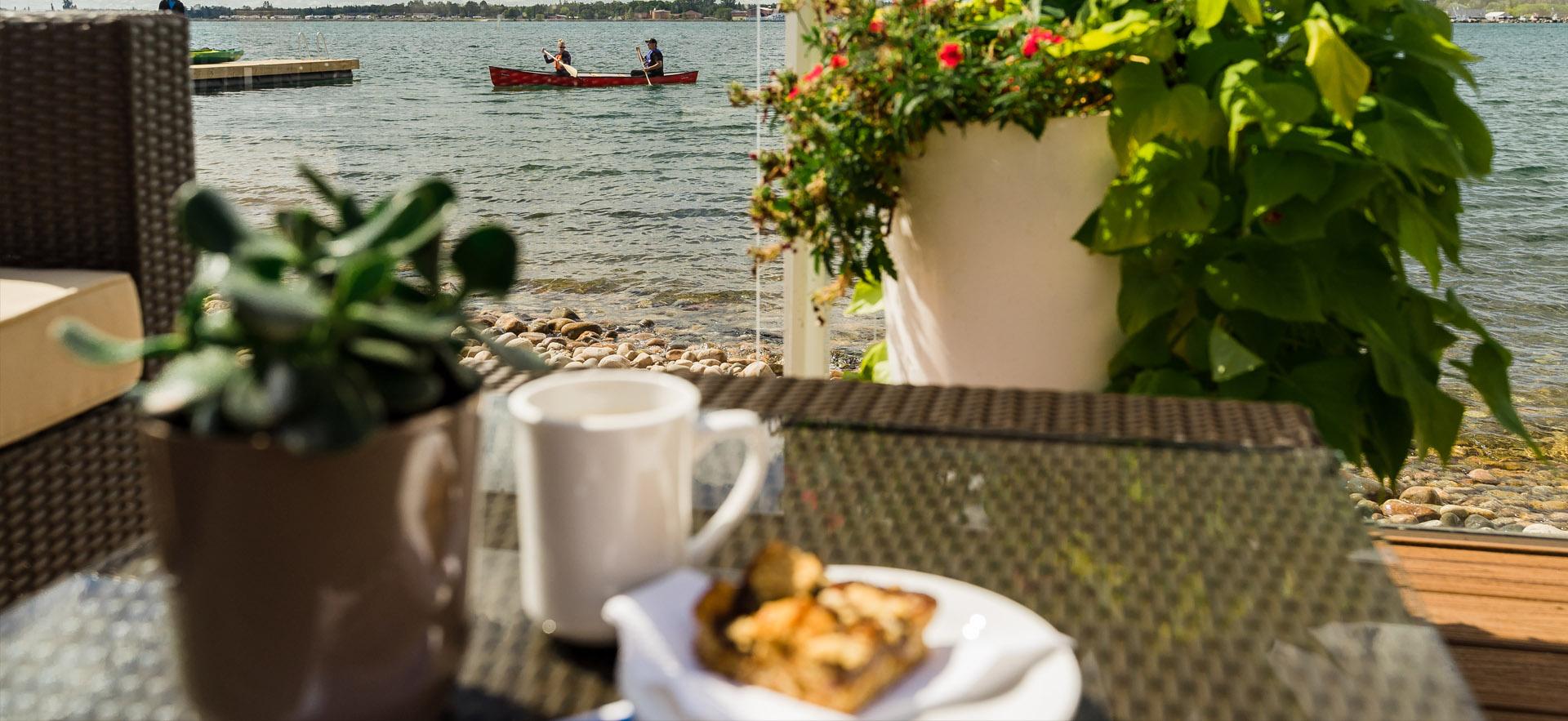patio view with coffee and treat