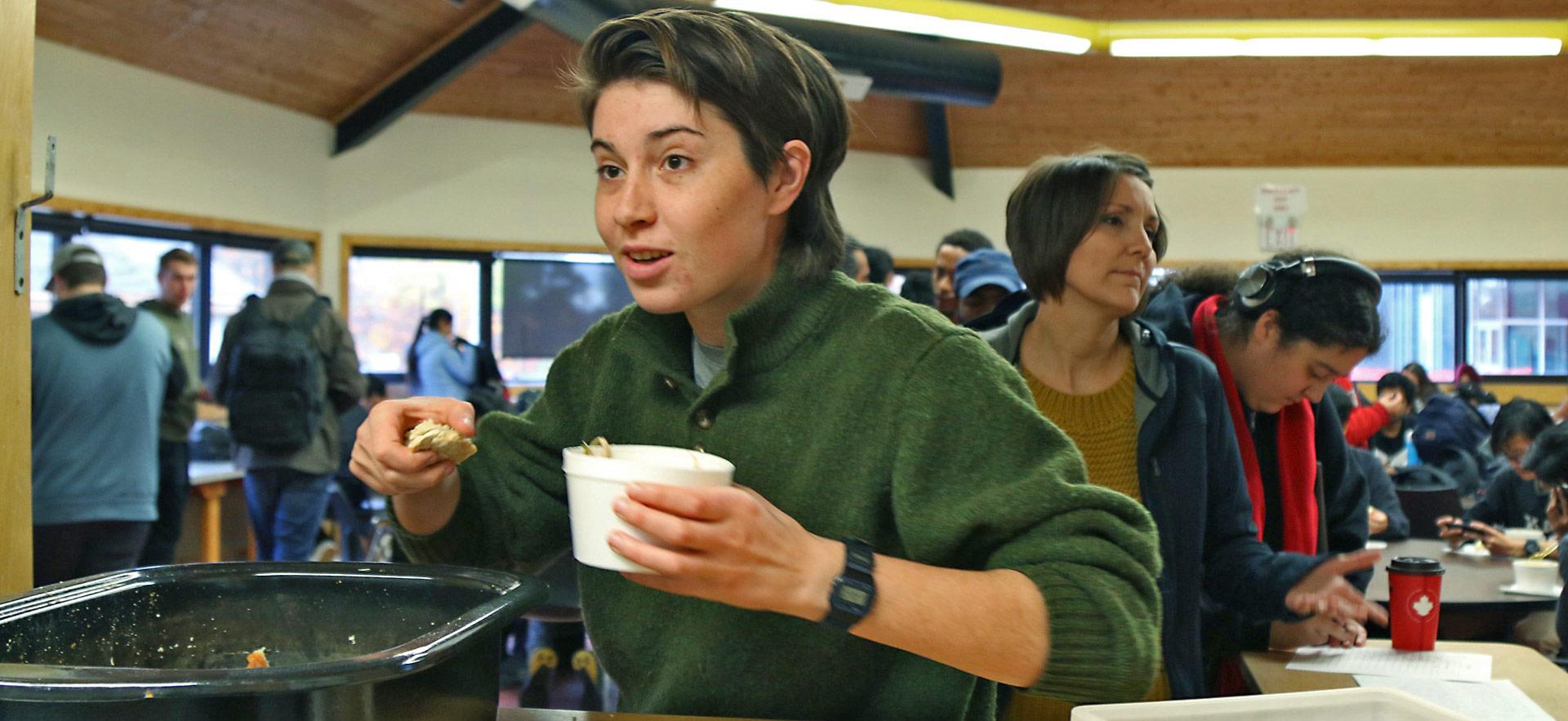 indigenous student getting a meal at gathering