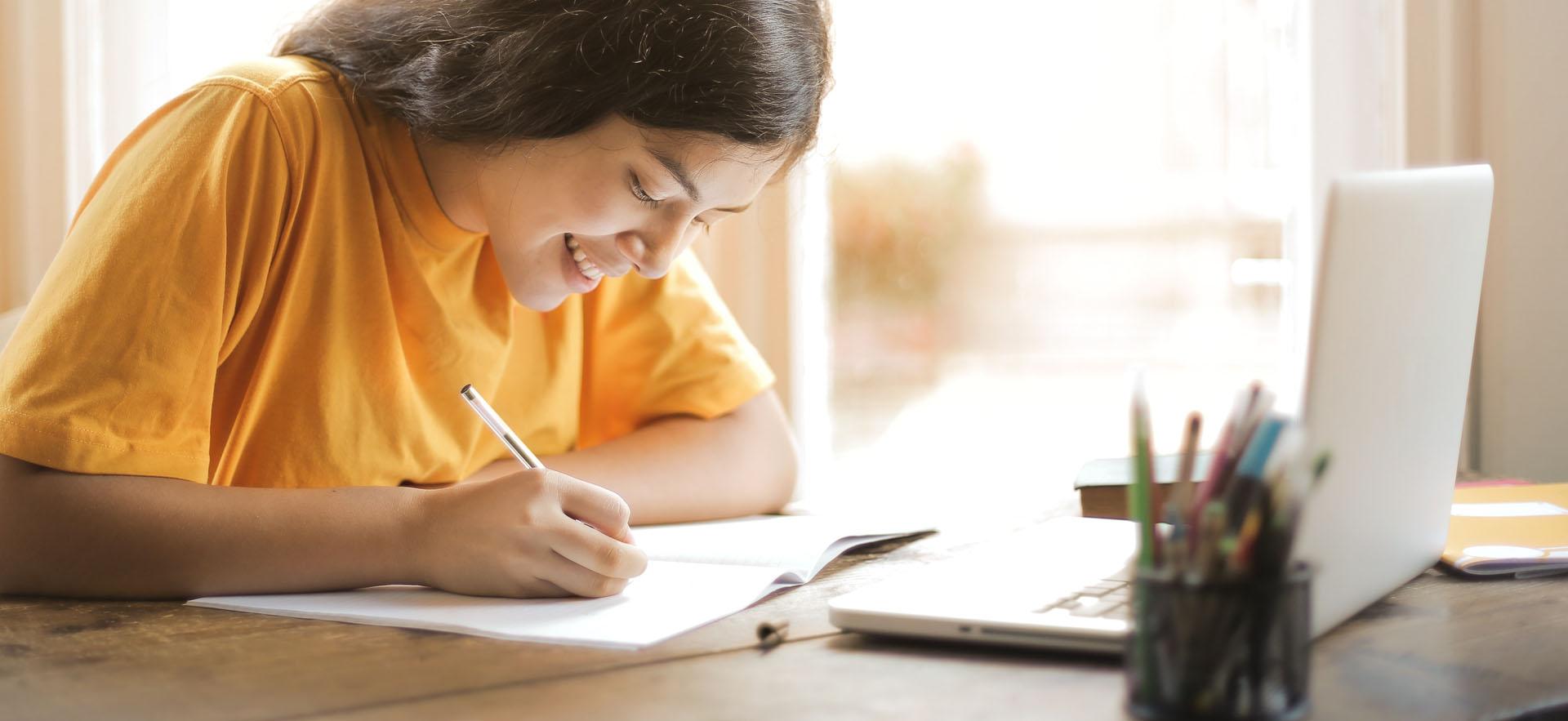 High school student working at her computer