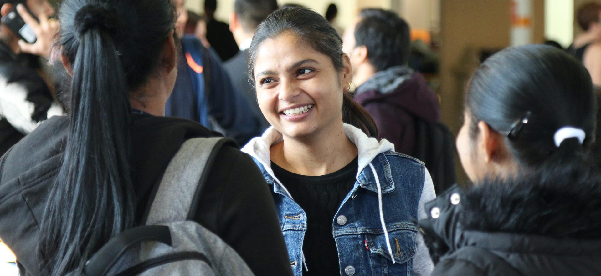 International students smiling in group of students