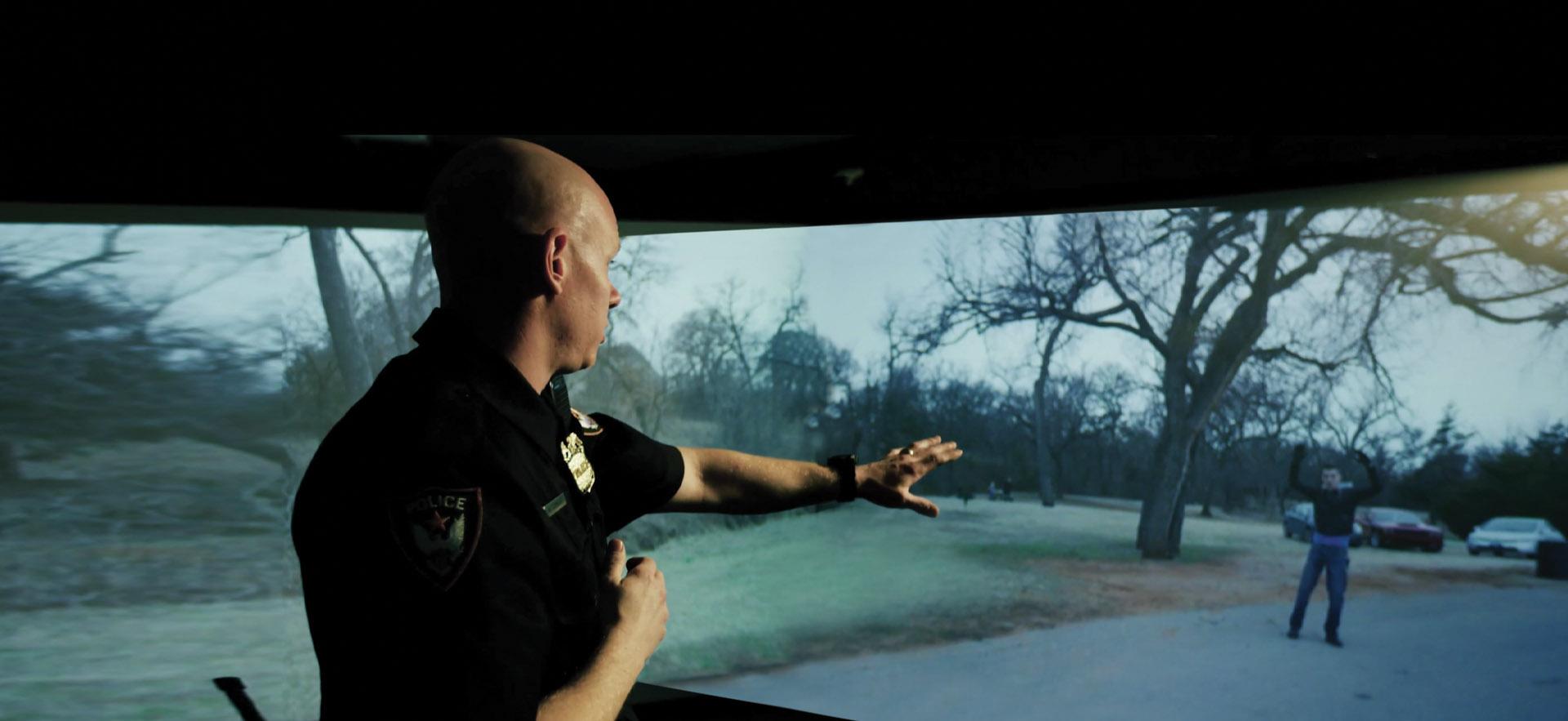 A male demonstration of a justice studies simulator. 