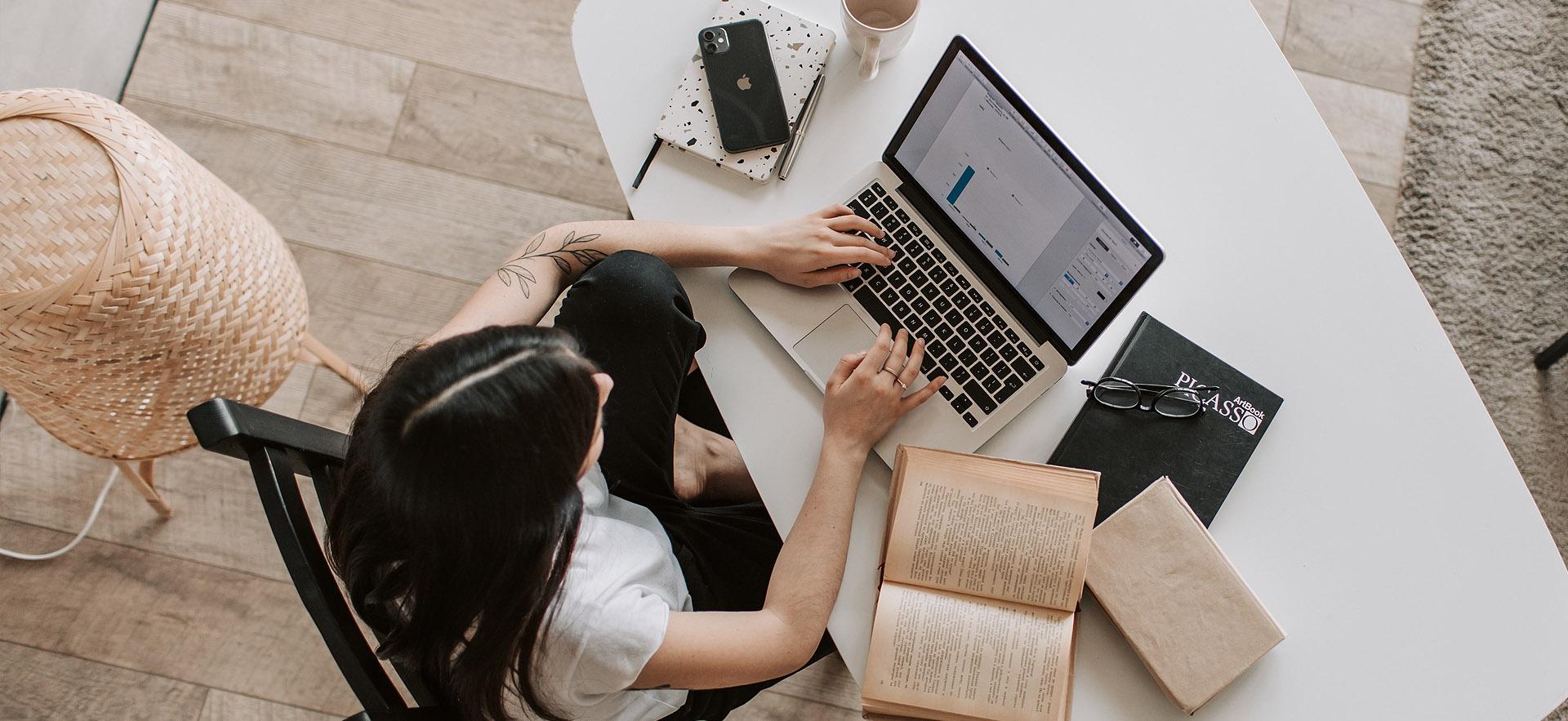 Girl on laptop working 