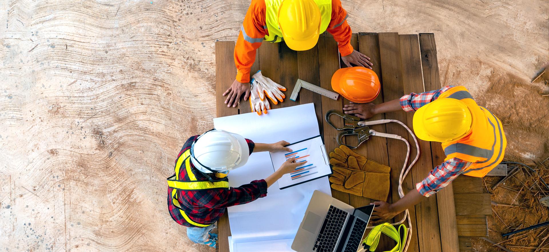 Construction group reviewing plans