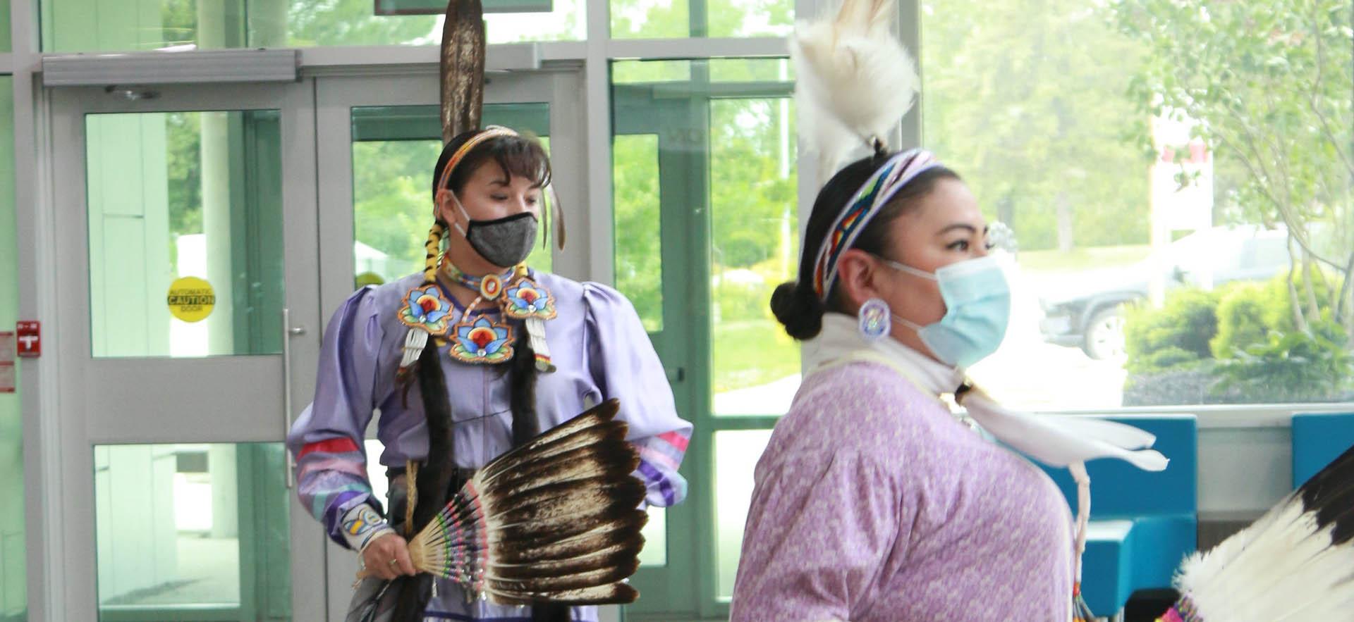 Indigenous dancers dancing at event