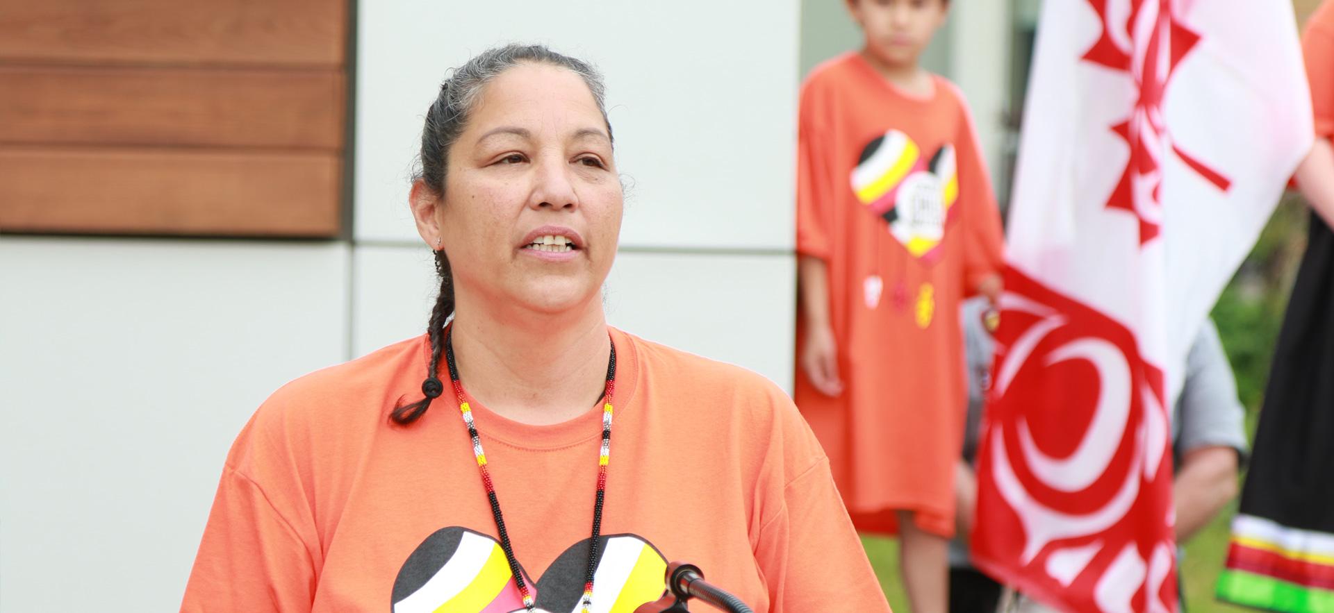 woman delivering speech