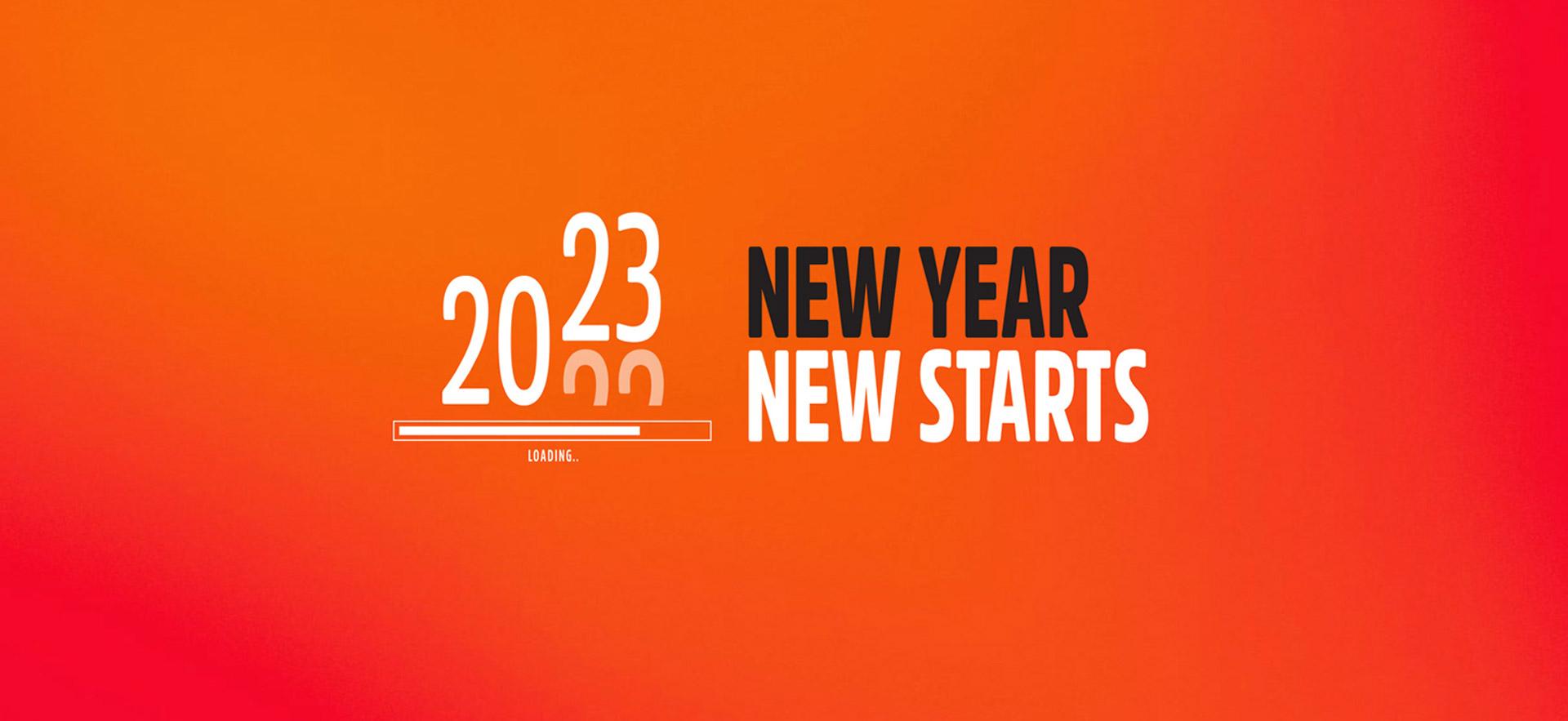 orange background with white text showing 2023 moving into place rotating 2022 out with new year new starts text beside it