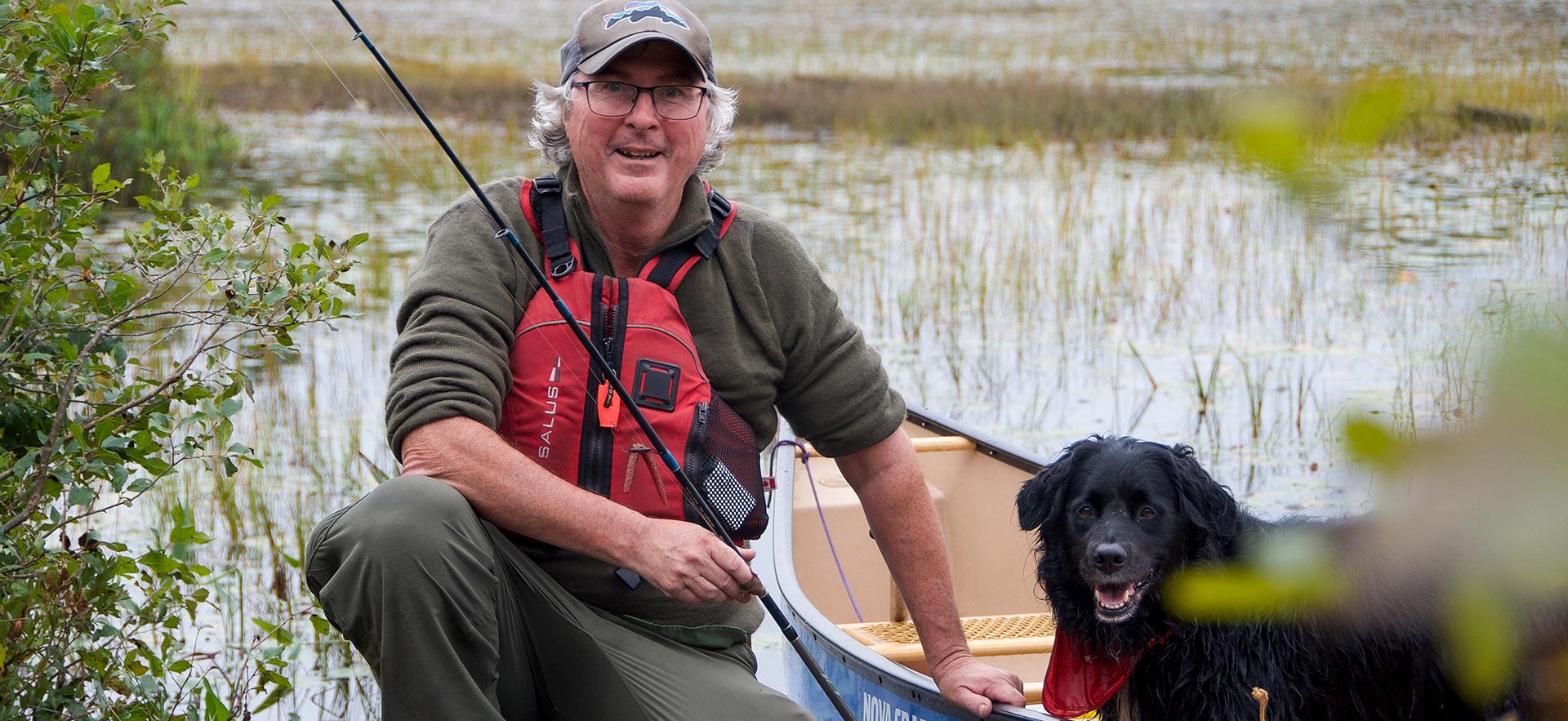 Kevin a graduate of our School of Natural Environment shown rowing a canoe