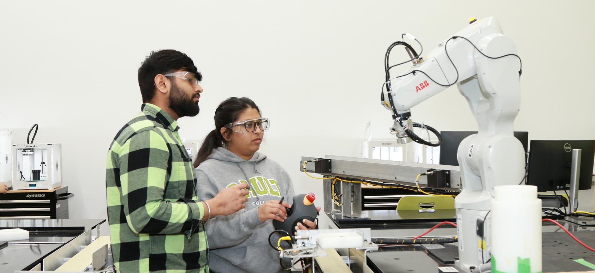 Bachelor of Engineering - Mechatronics students working in the robotics and engineering lab
