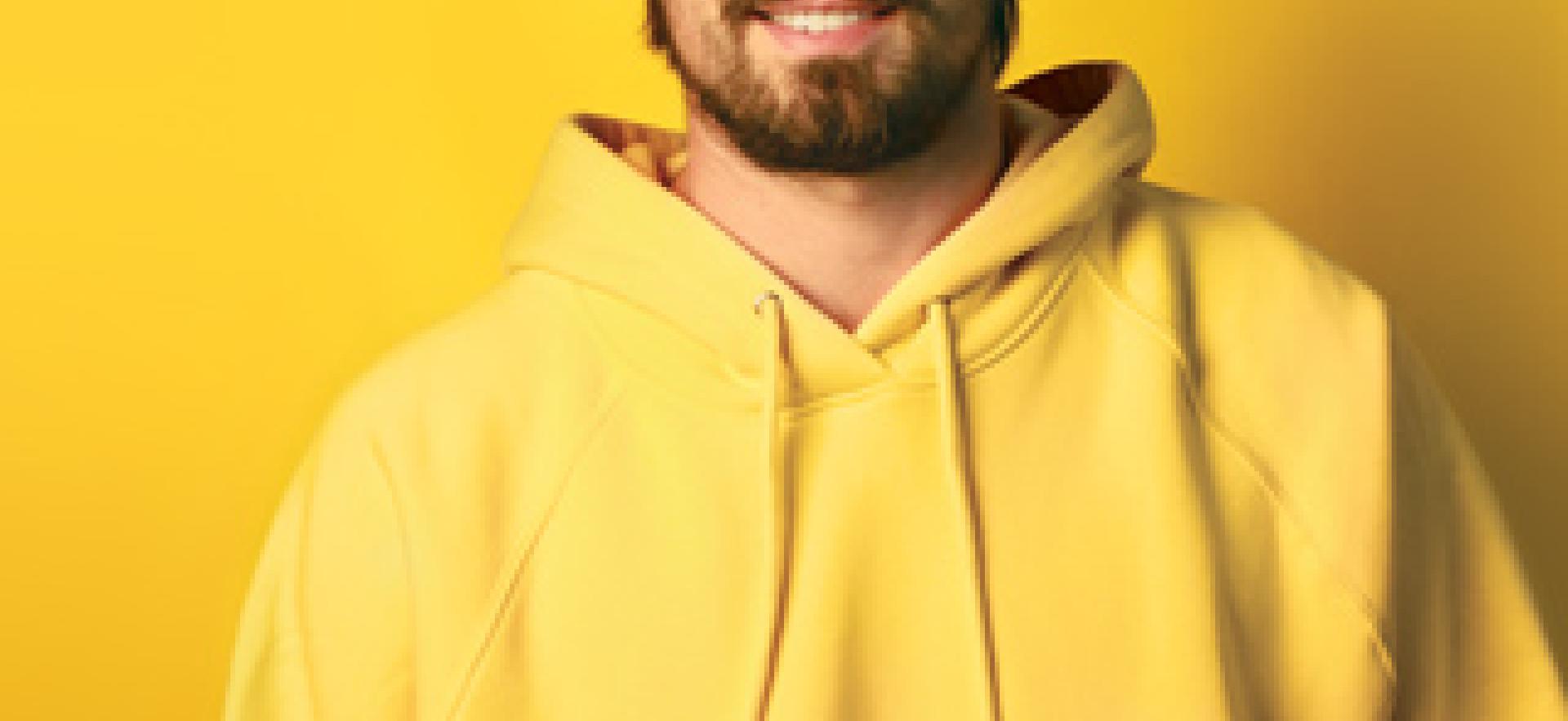 Deep Dive image with student in yellow hoodie with yellow background smiling at camera with text THEIR TIME TO BE