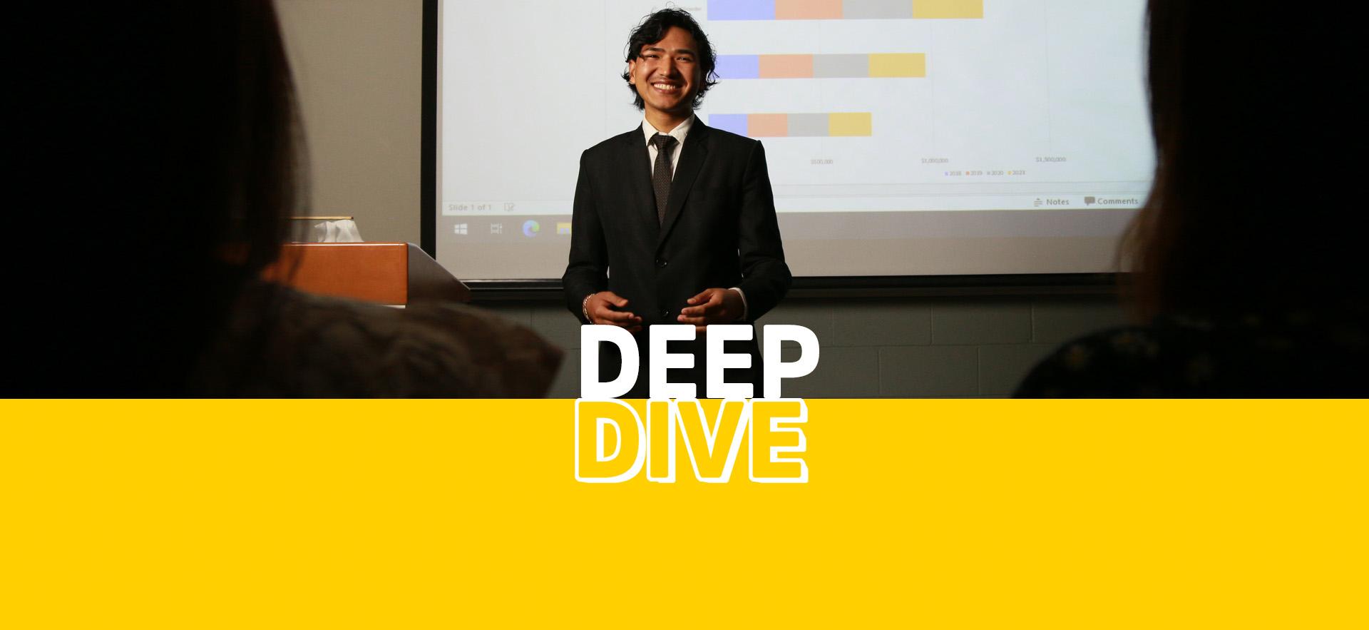 Deep Dive Business image with student in front of projector screen