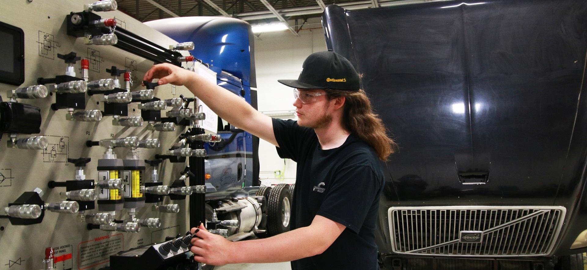 Heavy Equipment student in the lab