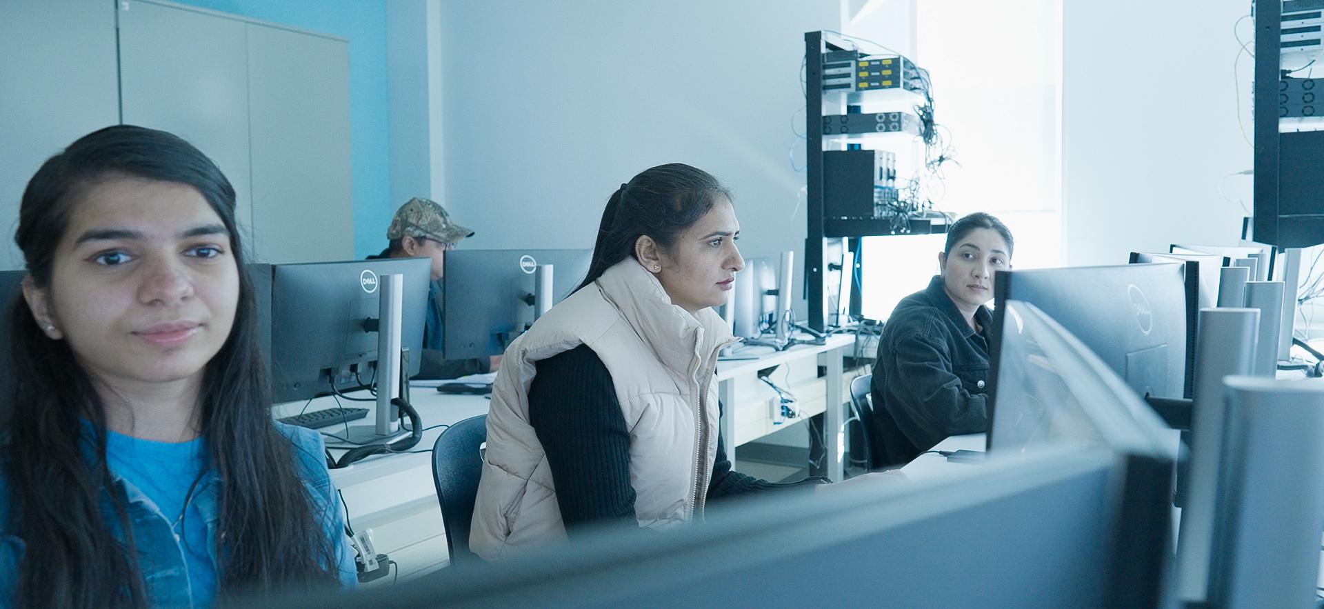 IT students working on computers in the lab
