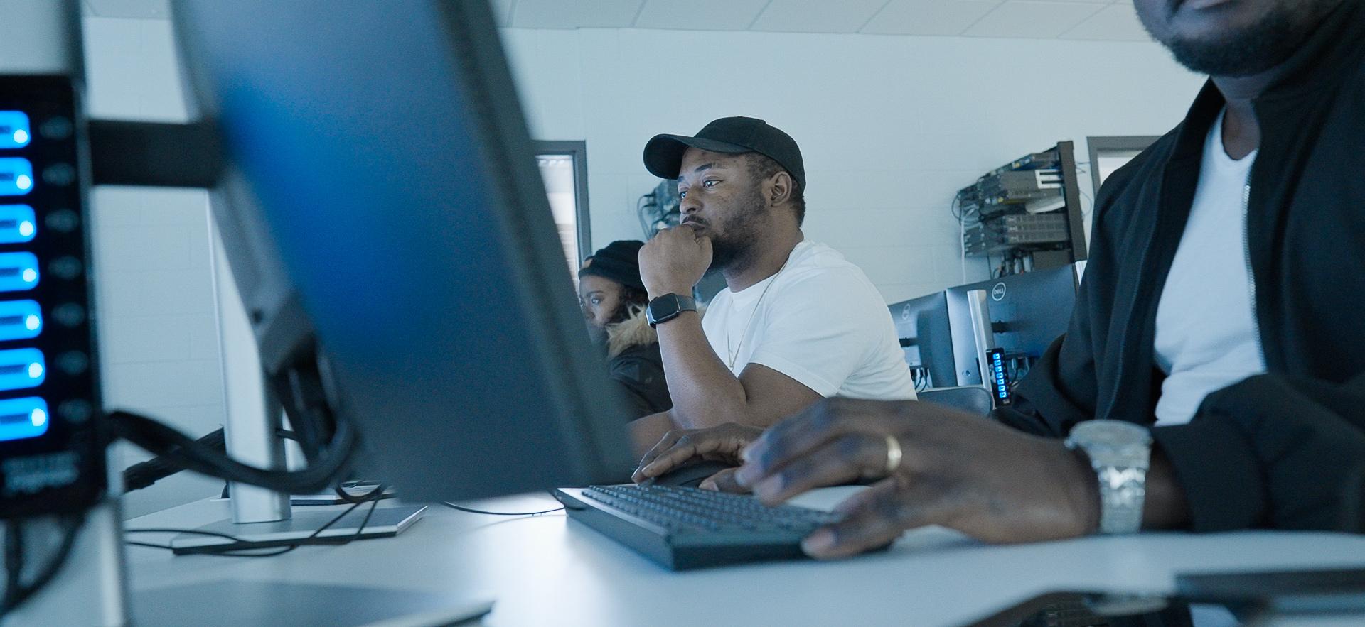 IT students working on computers in the lab