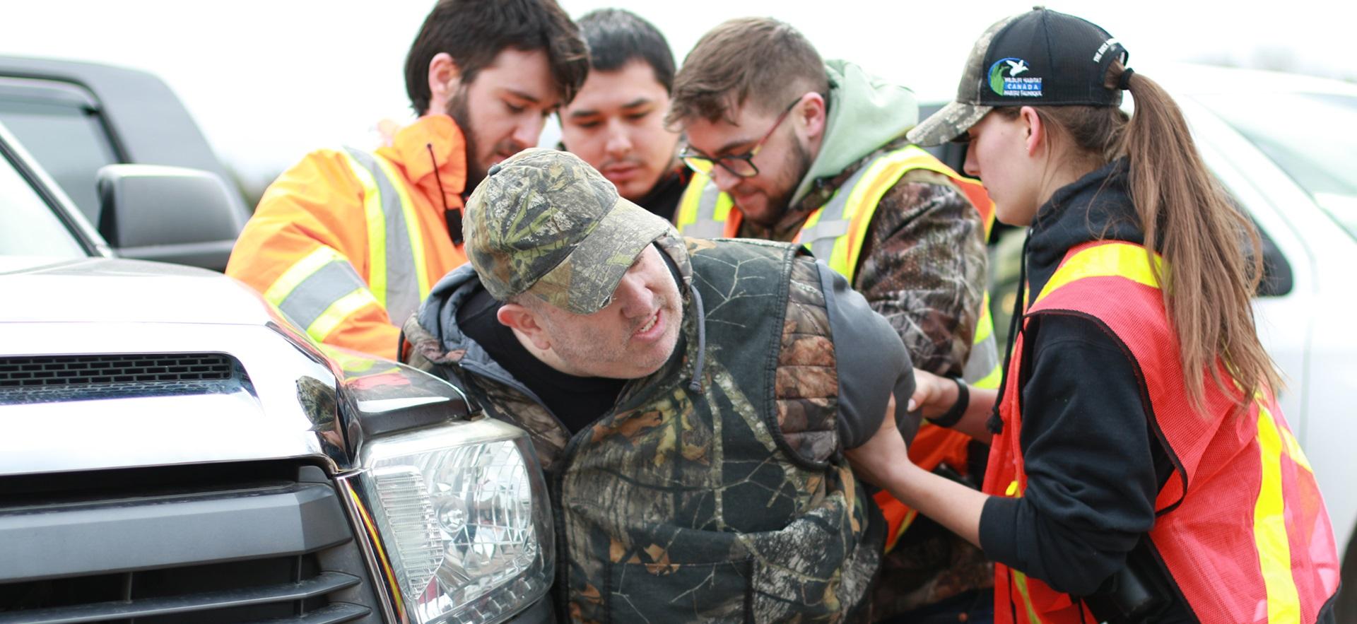 Natural Resource Environmental law students apprehending a hunter