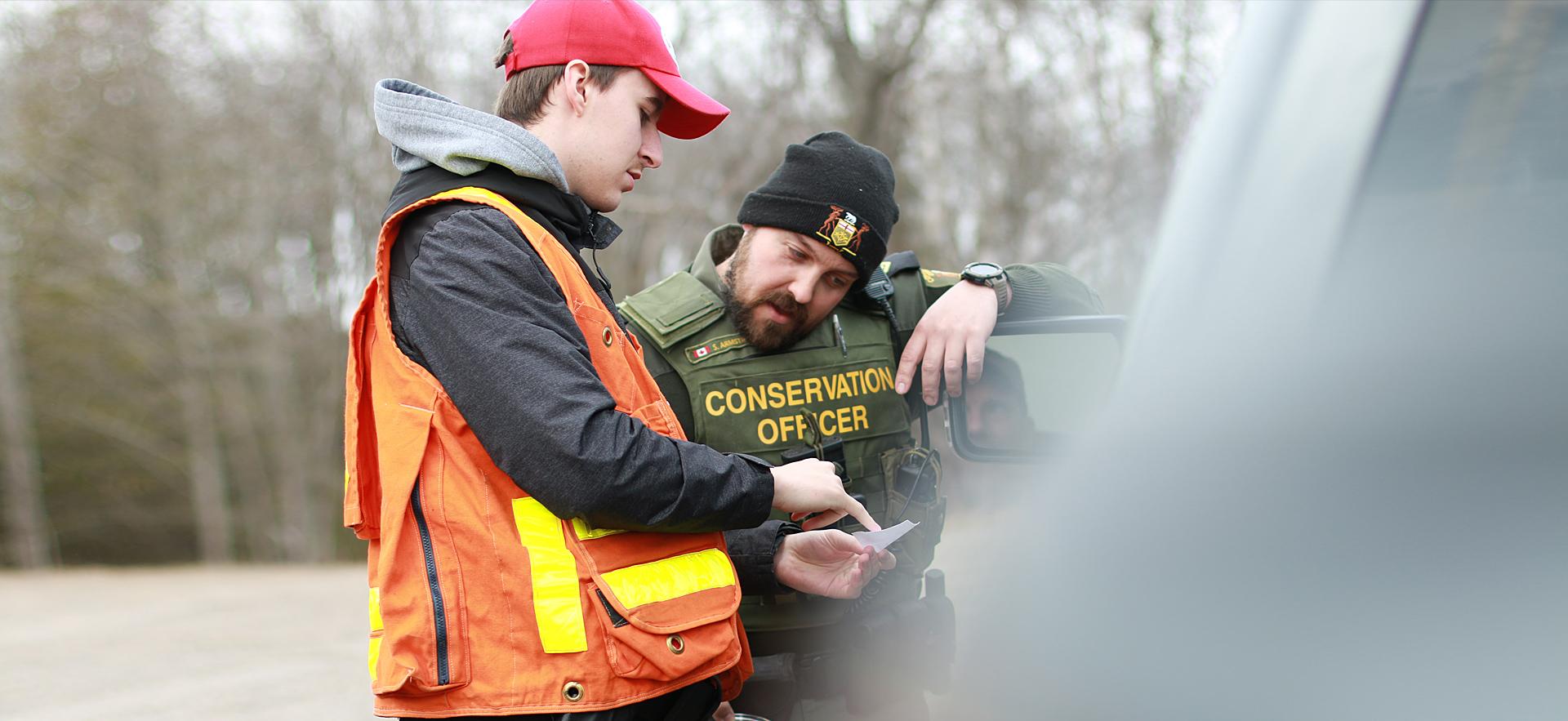 Natural Resource Environmental law instructor and student reviewing documentation