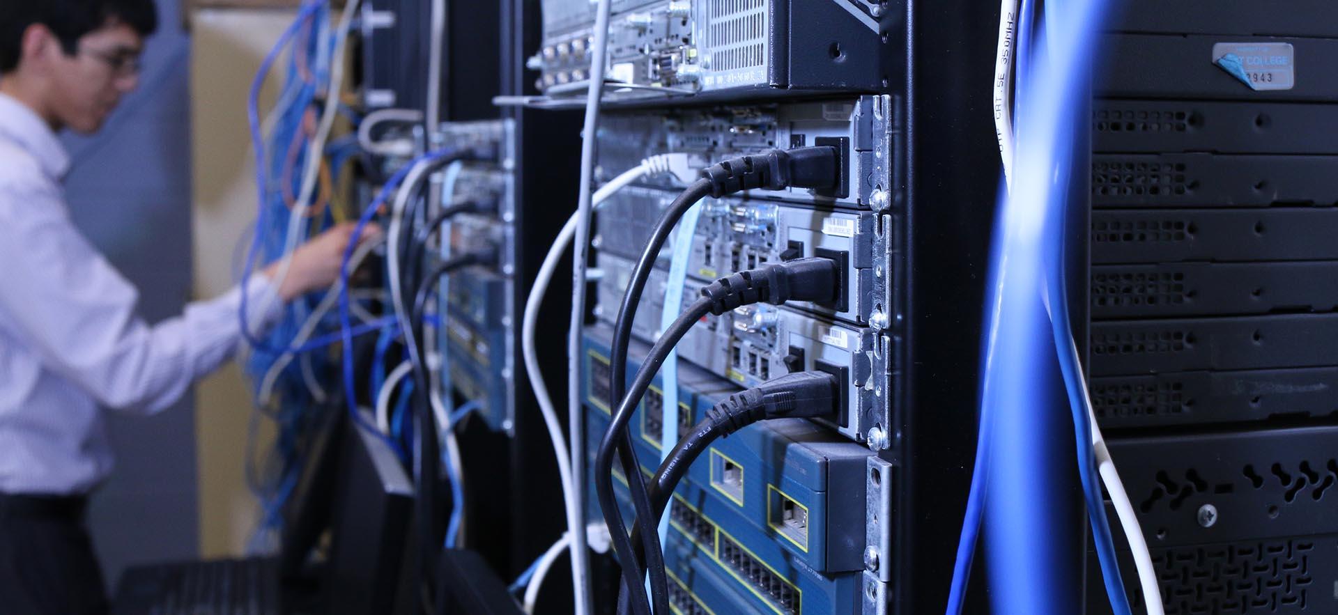 IT servers shown as students practice hands-on skills