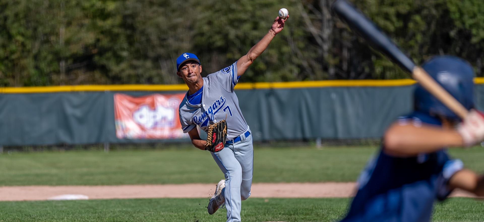 Baseball player pitching