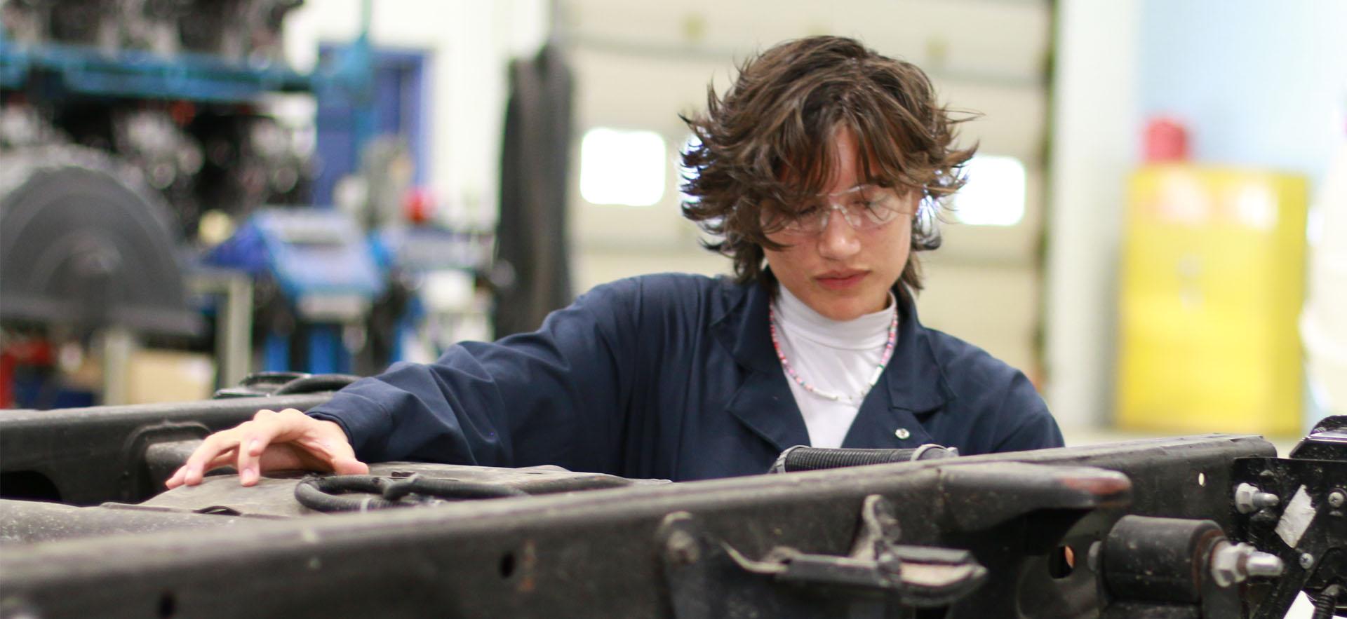 Woman working in the Motive Power Lab