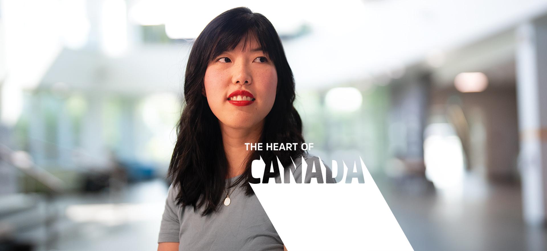 International student posed and smiling at the camera