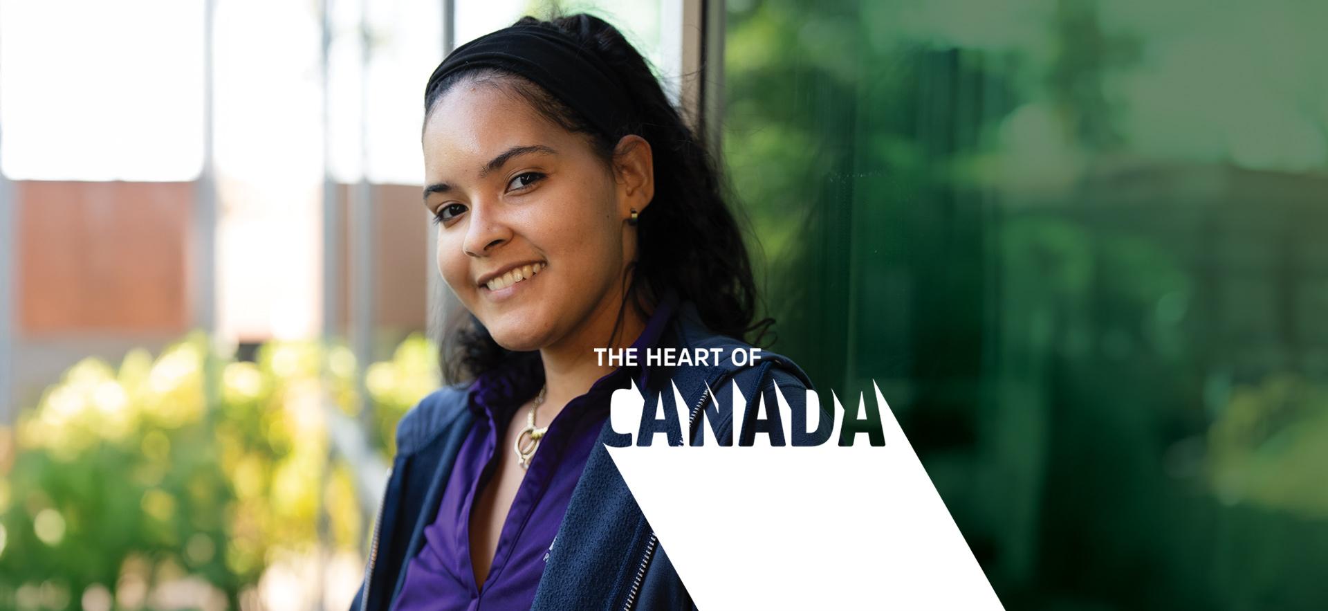 International student smiling and posing outdoors