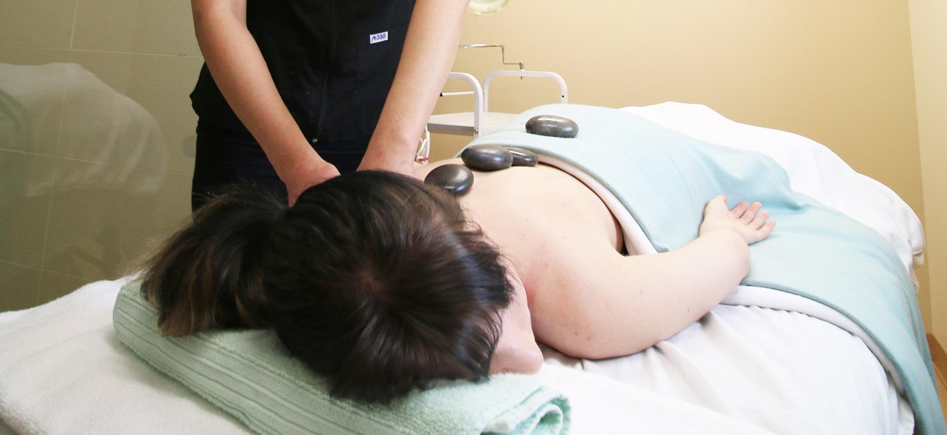 Esthetician student doing massage